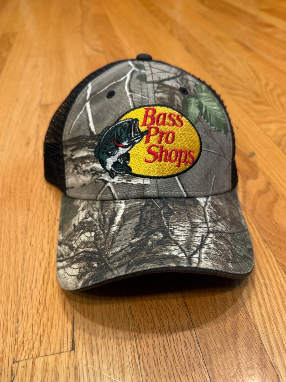 Bass Camo Trucker Hat with Yellow Logo